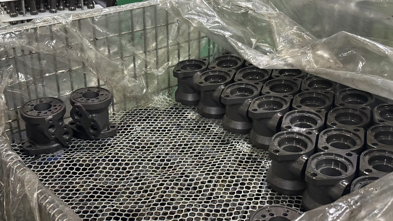 Cleaned hydraulic motor housings ready for assembly