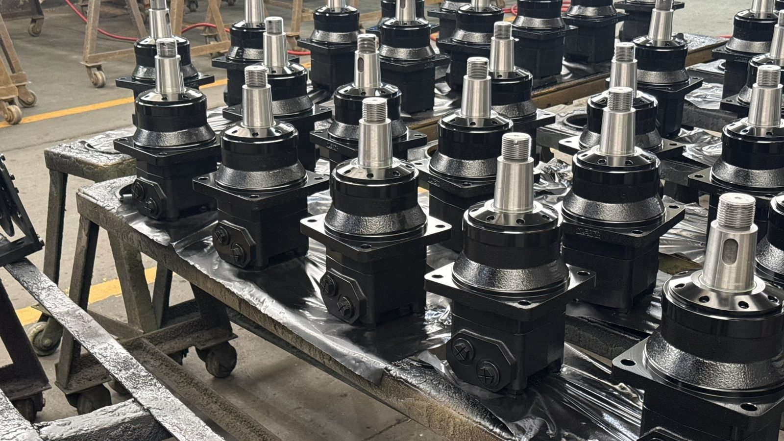 Painted orbital motors drying after robotic painting